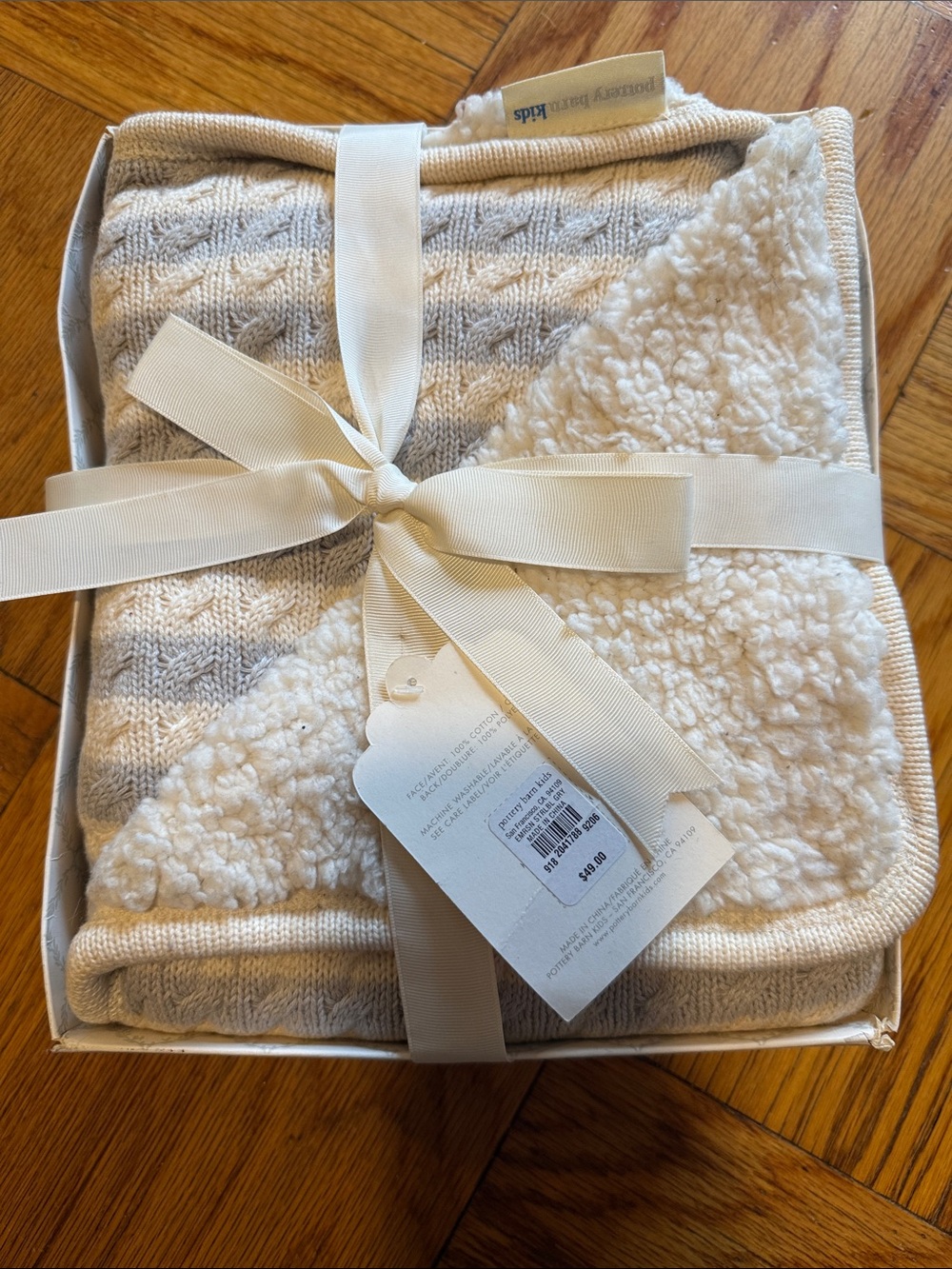 Brand new with tags! Pottery Barn Kids machine washable grey and white blanket